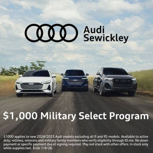 Image of three Audi models facing the camera on the road. Text describes $1000 savings for eligible military members.